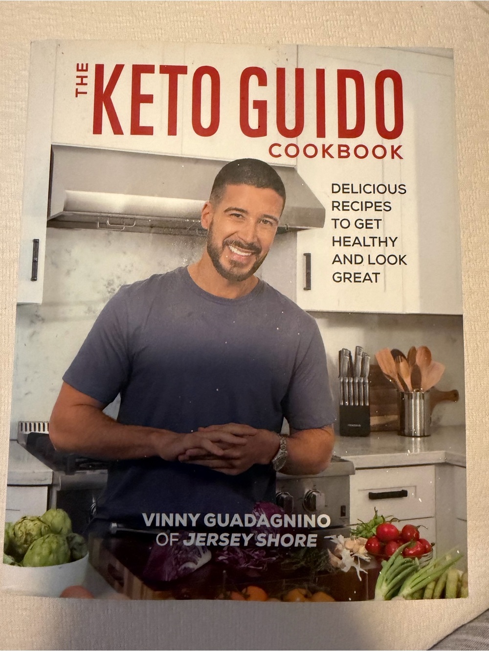 The Keto Guido Cookbook by - Navy Cover